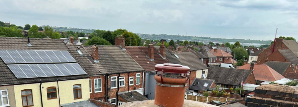 This is a photo taken from a roof which is being repaired by Giltbrook Roofing Repairs, it shows a street of houses, and their roofs